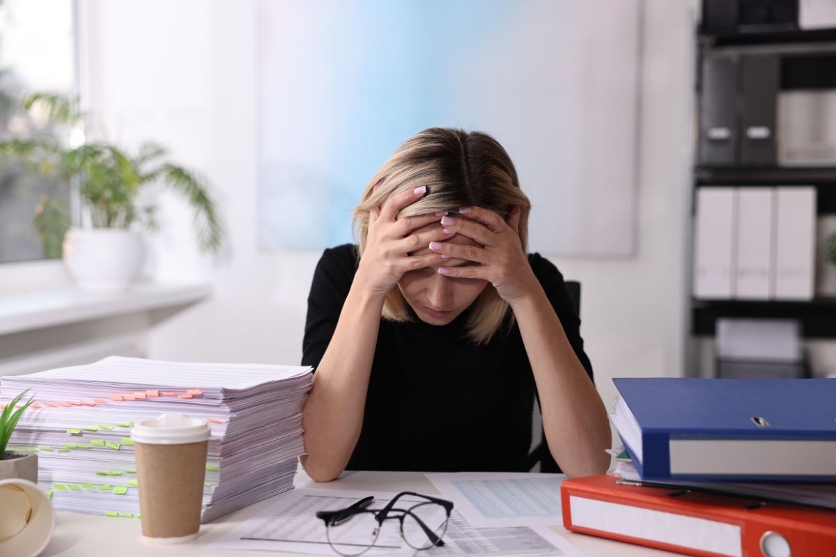 Sad PhD Candidate on Desk
